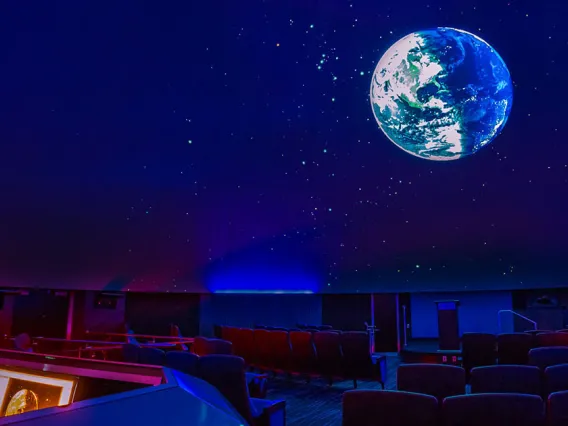 Planet earth shown on the planetarium dome