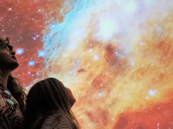 Mother and daughter at Flandrau planetarium