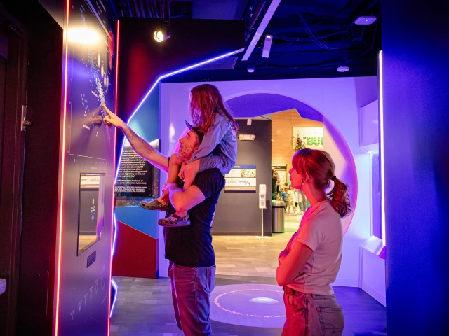 family sees astronomy exhibit in tucson at flandrau
