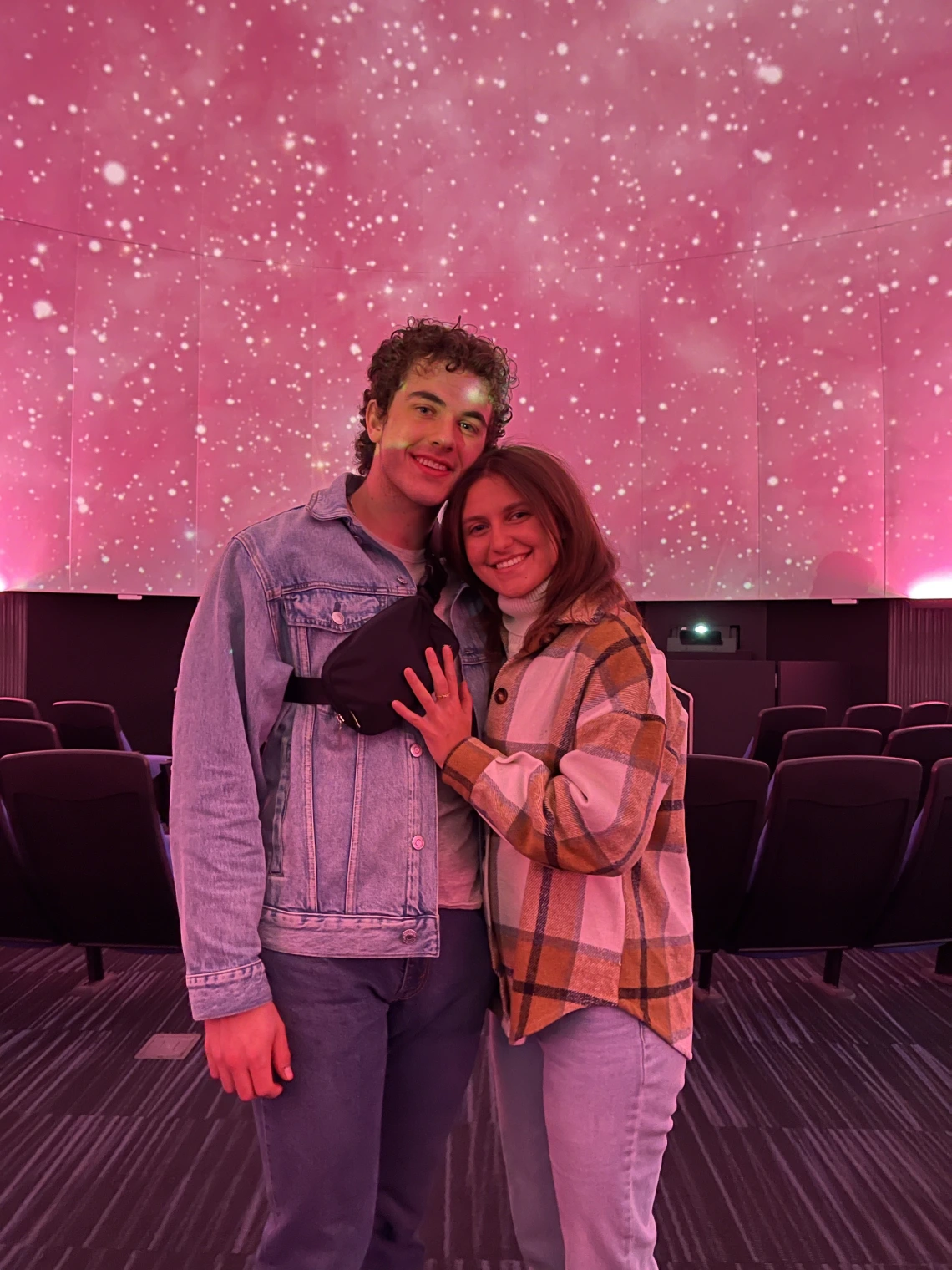 A couple inside Flandrau planetarium on Valentine's Day in Tucson