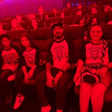 Family watching laser stranger things