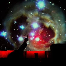 People watching a planetarium show